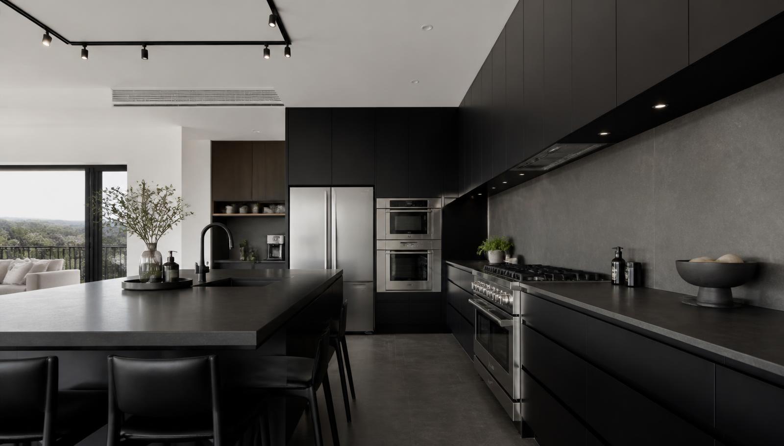 Cozinha moderna com armários pretos e bancada em grafite